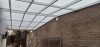 Imagen 1 de 9 de obra Cerramiento con techo de Policarbonato